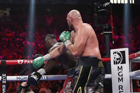 Tyson Fury beats Deontay Wilder in world title fight in Las Vegas.